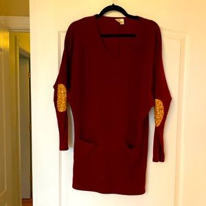 Holiday red sweater dress with gold sequin elbows